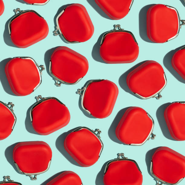 istock Red Coin Purse on blue background, flat lay 1436698730
