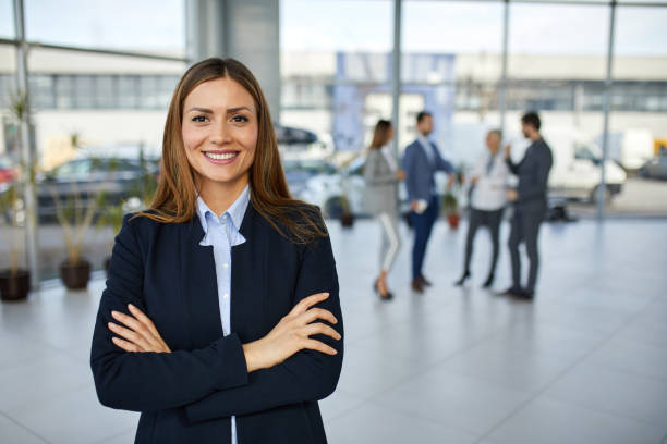 Portrait of a young smiling businesswoman at work stock photo