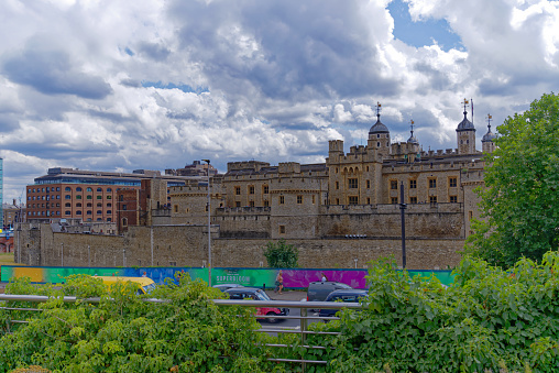 Famous castle Tower of London at City of London on a blue cloudy summer day. Photo taken August 1st, 2022, London, England.