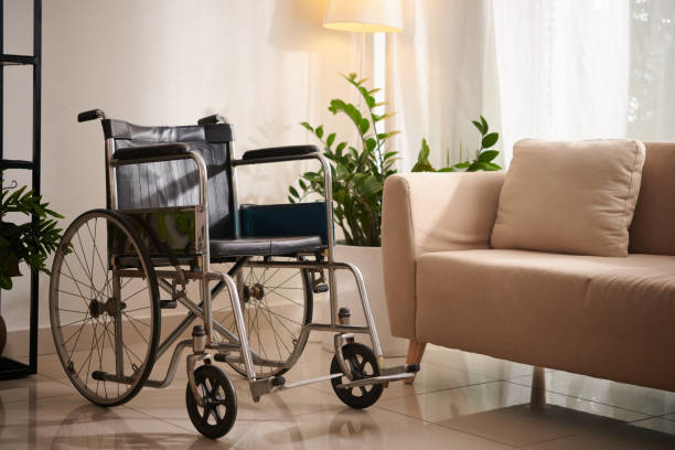 istock Empty Wheelchair in Living Room 1436703552