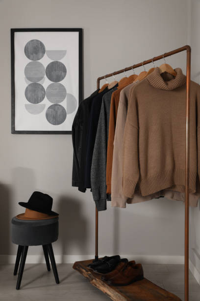 istock Modern dressing room interior with stylish clothes, shoes and decorative elements 1436708728