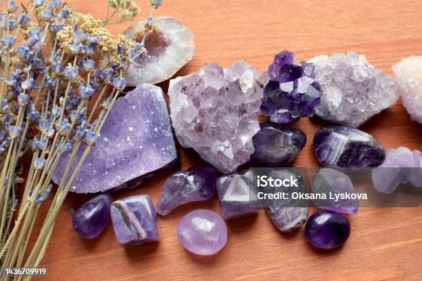 Beautiful Amethyst Stones And Amethyst Druze With Dry Lavender Bouquet On Wooden Background Magic Amulets Stock Photo - Download Image Now