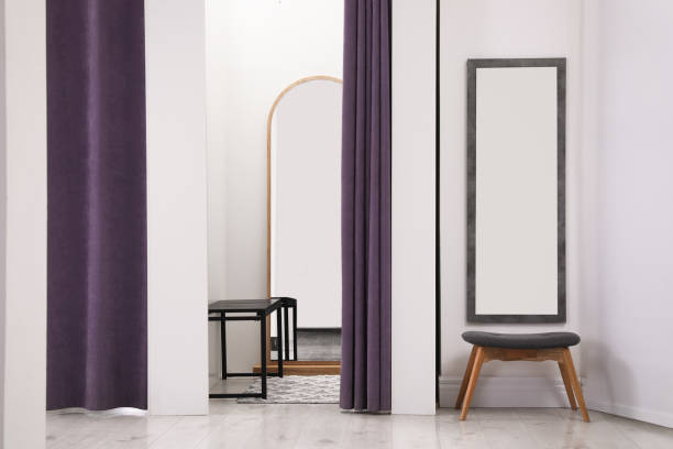 Empty dressing room in fashion store. Stylish interior