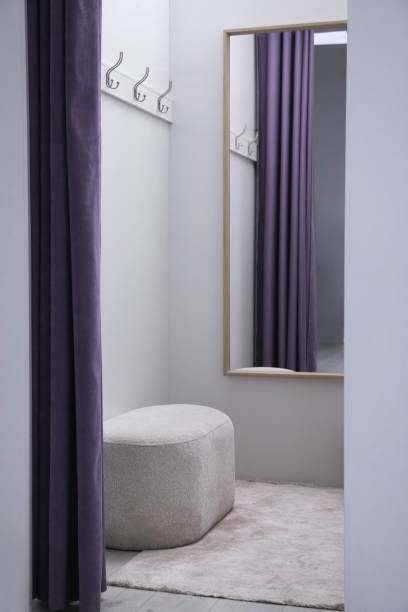 istock Empty dressing room in fashion store. Stylish interior 1436710874