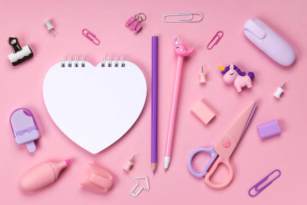 istock White heart notebook pink background surrounded stationery 1436711055