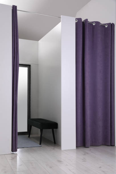 istock Empty dressing room in fashion store. Stylish interior 1436711847