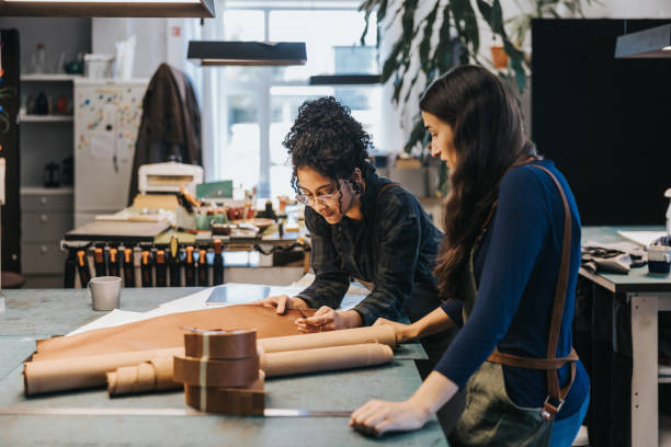 istock Latin clothing designers working in their studio 1436712480