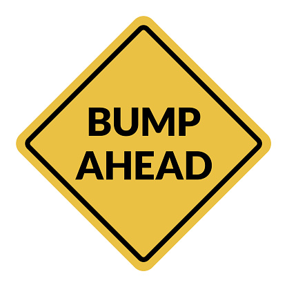 Bump Ahead traffic sign. Black on yellow diamond background. Traffic signs and symbols.