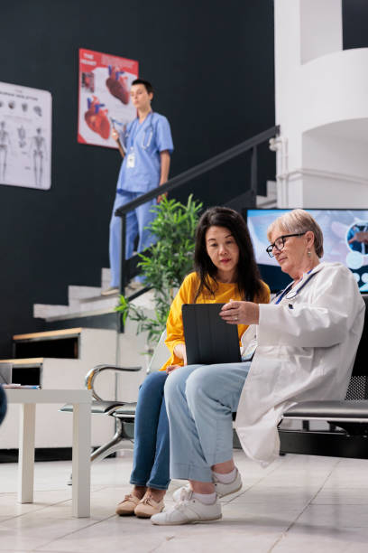 istock Physician specialist doing consultation with asian patient 1436715184