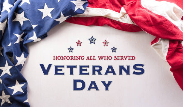 istock Happy Veterans Day concept made from American flags and the text against white background. November 11. 1436715241