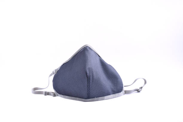 istock Blue medical face mask on a white background. 1436716031