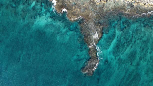 istock Aerial view of cliffs near a blue sea 1436716186