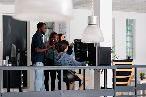 Diverse Team Of Web Developer Analyzing Html Code On Terminal Window ...