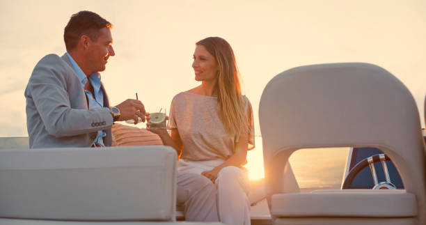 istock Couple having cocktail on luxury yacht 1436720030
