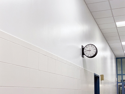 Clock on a wall in a corridor