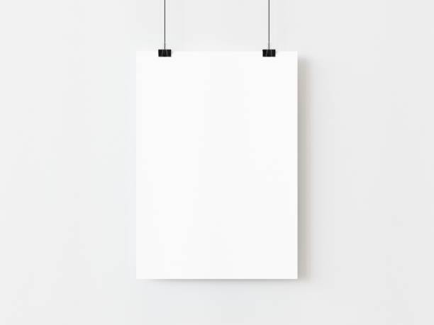 istock One blank vertical rectangle poster template hanging on thread with paper clips on white background. 3D illustration 1436722854
