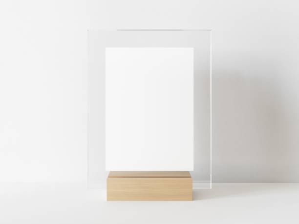 istock Vertical rectangle white menu with transparent frame on a light wood stand. Card display promotion and information for customer, picture stand,sign holder and photo frame template. 3D illustration 1436723451