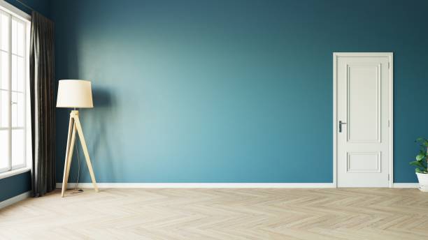istock Modern style empty blue room with woode floor window sun light effect with tall lamp next to a dark luxurious curtain on the left and white door on the right. 3d illustration. 1436723618