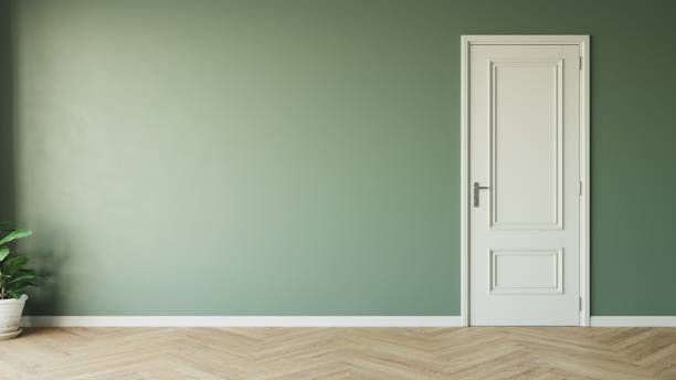 istock Modern style empty green room with wood laminate floor window sun light effect with white ceramic vase of green plant on the left and white door on the right. 3d illustration. 1436723668