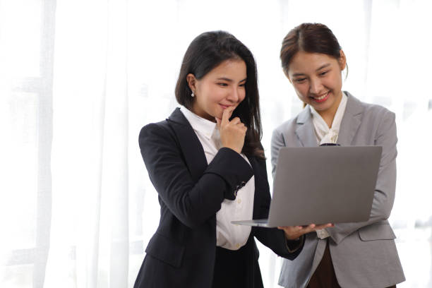 istock Colleagues, businesswomen or partners discussing, exchanging ideas, discussing successful business projects. 1436737383