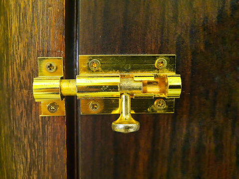 A metal latch door lock