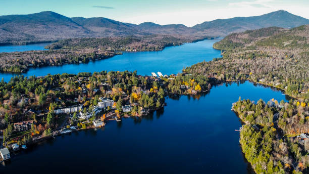 Mirror Lake & Lake Placid An aerial photo of Mirror Lake and Lake Placid with Whiteface Mountain in the background whiteface mountain stock pictures, royalty-free photos & images