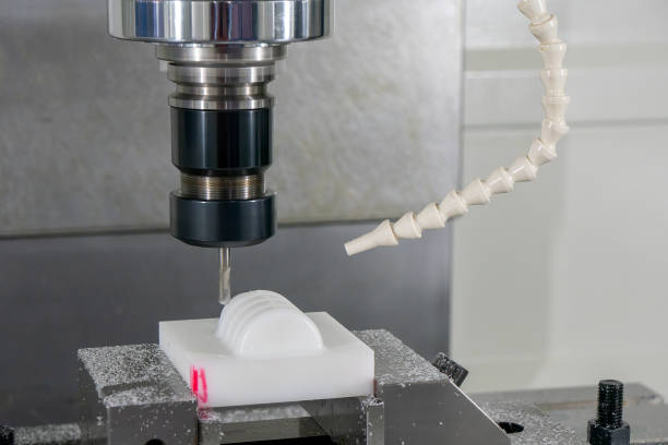 istock The  CNC milling machine cutting the nylon 6 material part with ball end mill tool. 1436743272