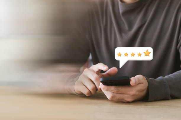 istock User give rating to service experience on online application, Customer review satisfaction feedback survey concept, Customer can evaluate quality of service leading to reputation ranking of business. 1436743685