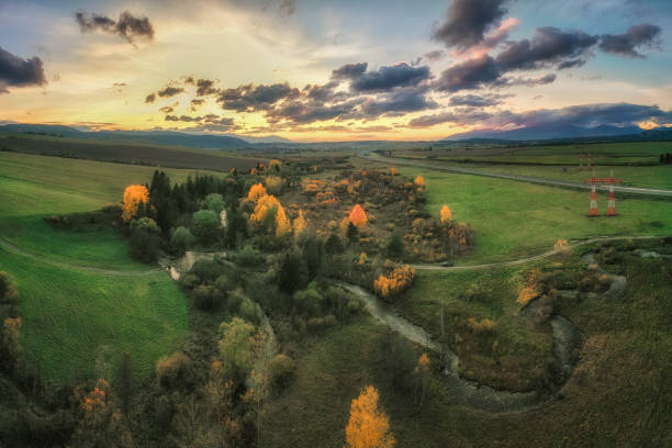 istock autumn landscape with yellow trees and small stream 1436748132