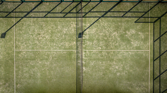 Drone image of an empty tennis court.