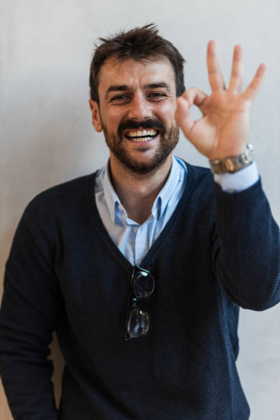istock Handsome young man posing for a photo while saying everything is A-Okay 1436754680