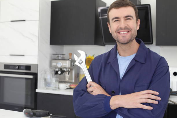 istock Repairman holding tool in the kitchen 1436754740