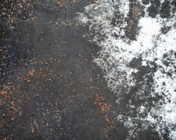 Salt and grit for safety on a pavement during winter