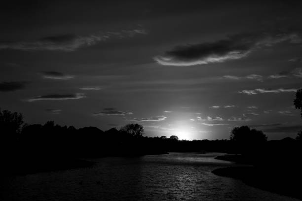 A black and white image of an autumn Iowa sunset.
