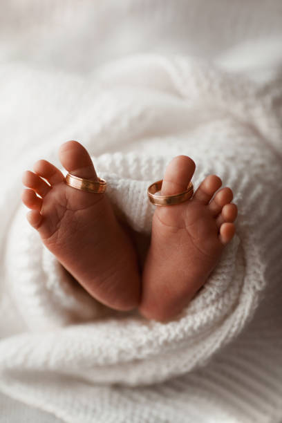 istock Newborn baby’s feet’s and heels in the blanket 1436761488