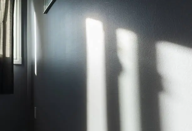 Photo of Morning sunlight casted on bedroom wall