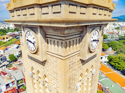 Historic belfry in Nafplio made by stone, with clock