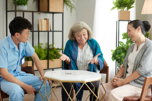 istock Senior Woman Lost in Card Game 1436773638