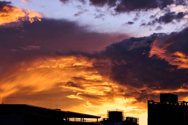 Dramatic sunrise sky photo with multiple colors.