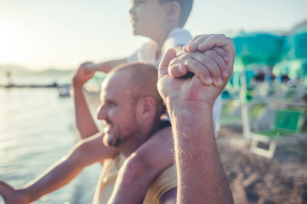 father and son at the seaside