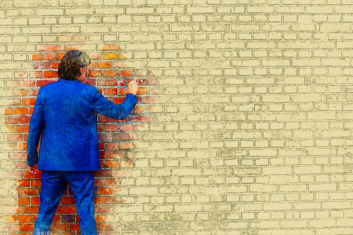 businessman in blue suit standing at brick wall with paintbrush in watercolor style