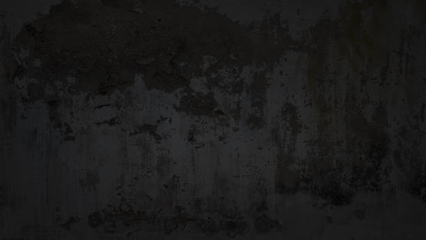 old dark black grungy concrete wall use as background or texture. texture of rusty black stain cracked concrete wall great for your design. black old wall with shabby damaged plaster. - abounding imagens e fotografias de stock