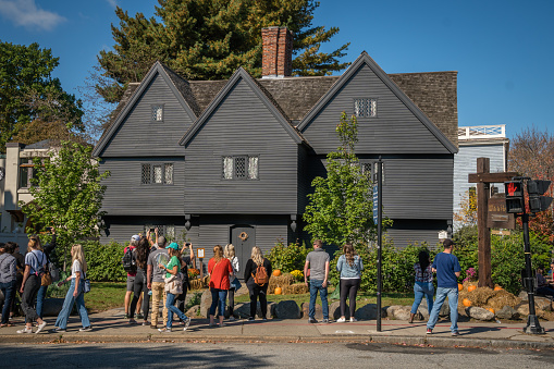 Salem, MA, US-October 14, 2021: Tourists in front of the Corwin House also known as the Witch House during the annual Haunted Happenings Festival.