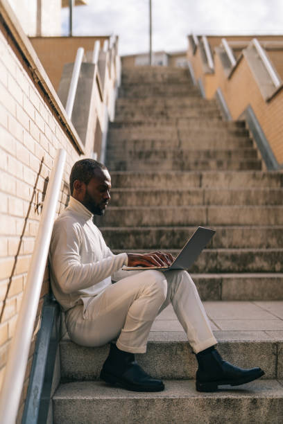 istock Digital nomad working with computer in the city 1436786944