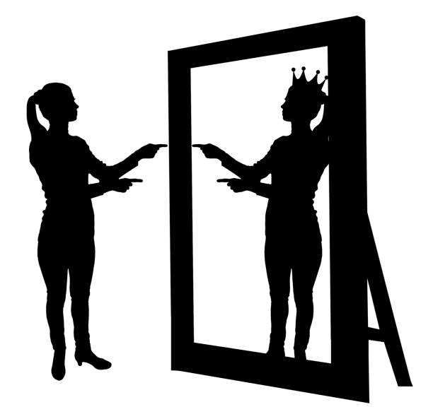 istock Silhouette vector of a narcissistic woman raises her self-esteem in front of a mirror 1436790744