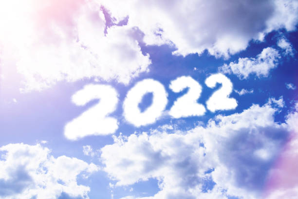 istock Text caption 2022 in clouds. Cloud-style text in sunny glare. 1436791279