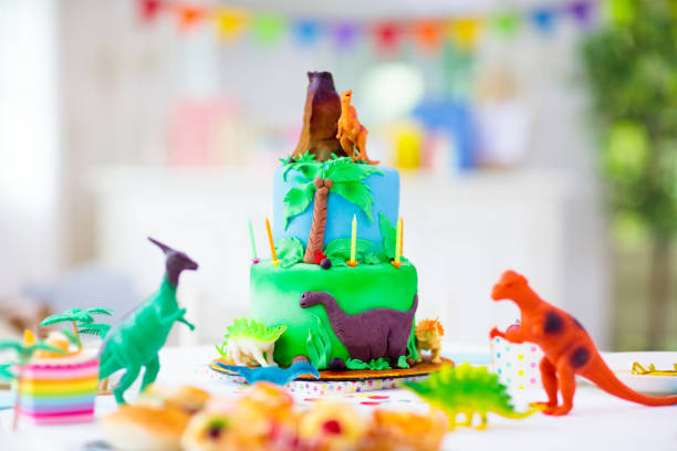 istock Kids birthday party. Dinosaur theme cake. 1436793263