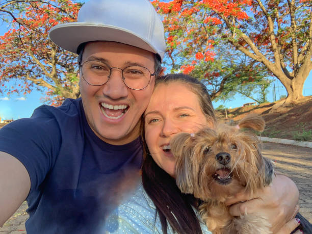 istock Happy couple with their pet 1436805676
