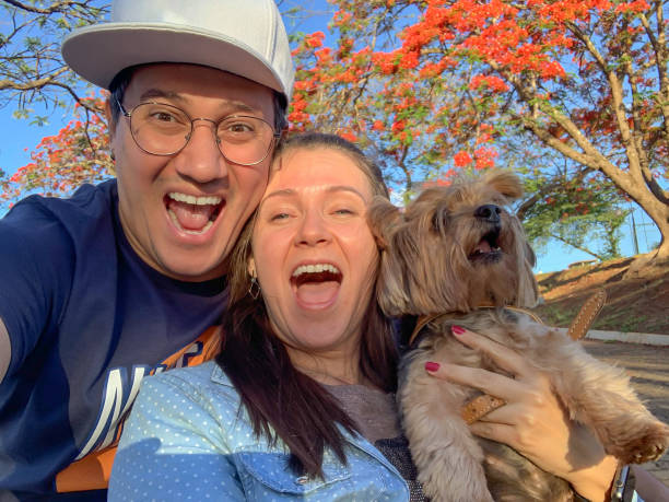 istock Happy couple with their pet 1436805707