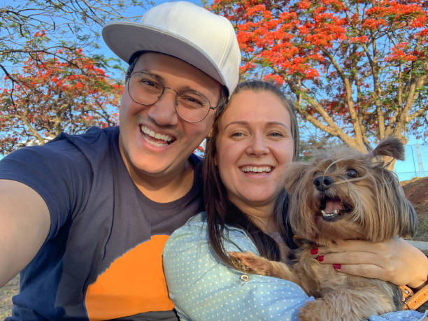 istock Happy couple with their pet 1436805720